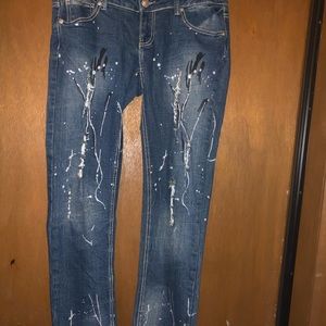 Factory Paint splashes made on jean front & back.